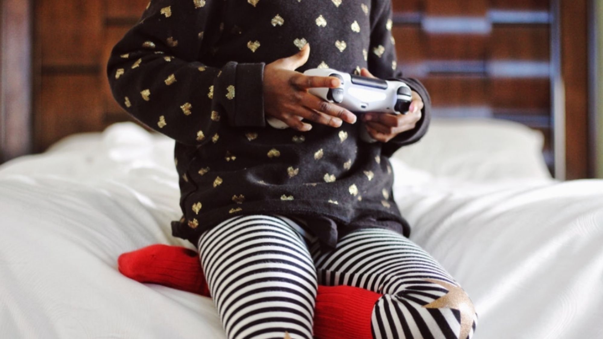 girl playing video game